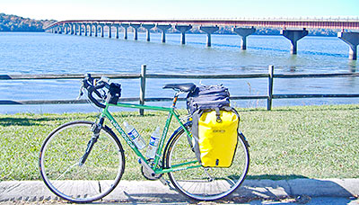 Bicycle parked near a bridge